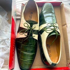 A pair of green and off white  dress shoes